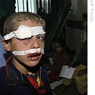 A wounded Palestinian boy is treated at the Shifa Hospital in Gaza City, after an Israeli missile strike, 05 Jan 2009