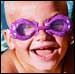Photo: A child in swim goggles