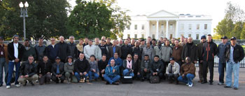 Participants in the current International Defense Management Course from 24 nations gathered in front of the White House during a field trip, Oct. 28.  Photo courtesy of the Defense Resources Management Institute. 