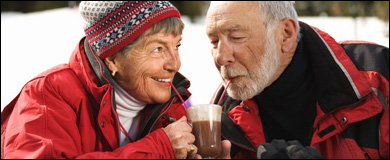 Photo: A senior couple drinking hot chocolate