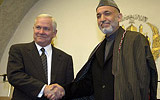 Defense Secretary Robert M. Gates and Afghan President Hamid Karzai