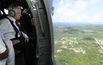 Defense Secretary Robert M. Gates takes an aerial tour of the Island of Guam during a recent trip to Anderson Air Force Base, Friday, May 30, 2008.  Secretary Gates is on a seven-day trip visiting the Pacific and to attend the 2008 Shangri-La Dialogues in Singapore.  Defense Dept. photo by Tech. Sgt. Jerry Morrison