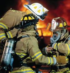 fire fighters rescue - wearing protective mask, gloves, and garments