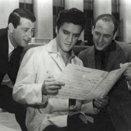 Mike Stoller, left, Elvis Presley and Jerry Leiber, right, MGM studio, Culver City California (File Photo - Spring 1957)