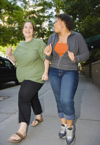 photo of two women walking