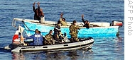 In this French Ministry of Defense photo,French soldiers arrest presumed Somali pirates off the Somali coast, 01 Jan 2009