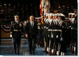 President George W. Bush reviews the troops at Ft. Myer in Arlington, Va., Tuesday, Jan. 6, 2009, during a military appreciation in his honor. With him is Col. Joseph Buche, Commander of Troops. White House photo by Joyce N. Boghosian