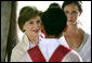 Mrs. Laura Bush and daughter Ms. Barbara Bush, right, visit a grammar class at the Mae La Refugee Camp at Mae Sot, Thailand, on August 7, 2008. At least 39,000 Burmese have gathered at this camp to escape oppression in their country. The camp is the largest of nine refugee camps in Thailand. White House photo by Shealah Craighead