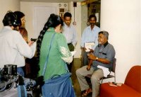 Image of Marathi poet Namdev Dhasal, surrounded by reporters in Mumbai.  Photo by Gaurav Sharma.