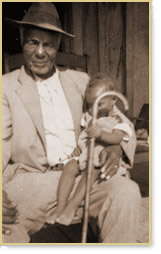 Bob Ledbetter with child on his lap