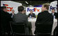 President George W. Bush meets with business leaders Friday, Oct. 6, 2006, at the FedEx Express DCA Facility in Washington, D.C., during a roundtable discussion on job growth and the economy. President Bush was joined at the meeting by U.S. Secretary of the Treasury Henry Paulson and Al Hubbard, Assistant to the President for Economic Policy. White House photo by Kimberlee Hewitt