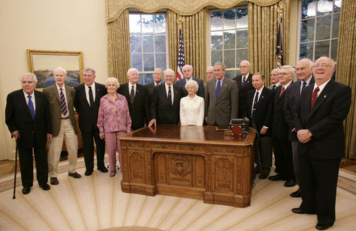 President George W. Bush meets with the members of the Supreme Headquarters Allied Expeditionary Force/Headquarters European Theater of Operations U.S. Army Veterans Association Friday, Oct. 6, 2006, in the Oval Office at White House. The group was organized in 1985 as a way to pay tribute to the memory of their supreme commander, Dwight D. Eisenhower, and their visit to the White House marks their 21st and final reunion gathering. White House photo by Paul Morse