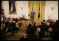 President George W. Bush welcomes invited guests Friday, Oct. 6, 2006 to the East Room of the White House, as part the festivities in celebration of National Hispanic Heritage Month. White House photo by Kimberlee Hewitt