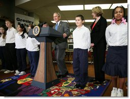 President George W. Bush visits with students Monday, Jan. 7, 2008, at the Horace Greeley Elementary School in Chicago, joined by U.S. Secretary of Education Margaret Spellings, right, where President Bush also delivered a statement highlighting the successes of No Child Left Behind and urged Congress to reauthorize it. White House photo by Joyce N. Boghosian