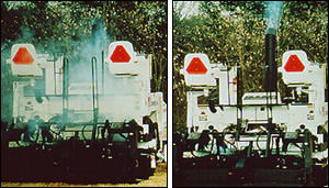 Before and after photos of design improvements to remove asphalt  fumes from the vicinity of workers via engineering controls. 