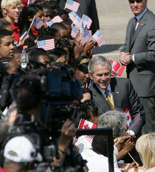 President George W. Bush poses for photos on the tarmac at Louis Armstrong New Orleans International Airport Monday, April 21, 2008, after arriving for the two-day 2008 North American Leaders' Summit. White House photo by Chris Greenberg