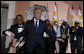 President George W. Bush steps on stage at the U.S. Chamber of Commerce reception to join members of the Euphonic Jazz Band Monday evening, April 21, 2008, prior to attending the 2008 North American Leaders’ Summit dinner in New Orleans. White House photo by Joyce N. Boghosian