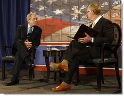 President George W. Bush participates in a question-and-answer session with Chris DeMuth, President of the American Enterprise Institute, Thursday, Dec. 18, 2008, at the Renaissance Mayflower Hotel in Washington, D.C. White House photo by Chris Greenberg