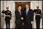 President George W. Bush greets Republic of Korean President Lee Myung-bak Friday, Nov. 14, 2008, upon his arrival for dinner with Summit on Financial Markets and World Economy Leaders at the White House. White House photo by Chris Greenberg