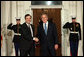 President George W. Bush greets Bank of Italy Governor and Financial Stability Forum Chairman Mario Draghi Friday, Nov. 14, 2008, upon his arrival for dinner with Summit on Financial Markets and the World Economy Leaders at the White House. White House photo by Chris Greenberg