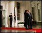 President George W. Bush greets President Cristina Fernandez de Kirchner of Argentina on the North Portico of the White House Friday, Nov. 14, 2008, before a dinner to open the Summit on Financial Markets and World Economy. White House photo by Joyce N. Boghosian