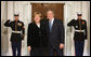 President George W. Bush greets German Chancellor Angela Merkel Friday, Nov. 14, 2008, upon her arrival for dinner with Summit on Financial Markets and World Economy Leaders at the White House. White House photo by Chris Greenberg