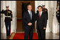 President George W. Bush welcomes President Hu Jintao of the People's Republic of China to the White House Friday, Nov. 14, 2008, for a dinner with Summit on Financial Markets and World Economy Leaders. White House photo by Chris Greenberg