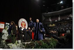 President George W. Bush waves as he leaves the stage following his commencement address at Texas A&M University's winter convocation Friday, Dec. 12, 2008, in College Station, Texas. White House photo by Eric Draper