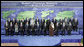 President George W. Bush stands with fellow world leaders Saturday, Nov. 15, 2008, for the family photo at the Summit on Financial Markets and the World Economy at the National Building Museum in Washington, D.C. White House photo by Grant Miller