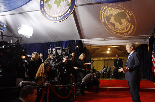 President George W. Bush addresses reporters following the arrival of G20 leaders and delegates to the Summit on Financial Markets and the World Economy Saturday morning, Nov. 15, 2008, at the National Building Museum in Washington, D.C. White House photo by Eric Draper