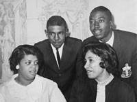Harry Briggs, Jr., Linda Brown Smith, Spottswood Bolling, Jr., and Ethel Louise Belton Brown during press conference