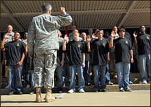 Chief of Staff of the Army Gen. George W. Casey Jr. administers the oath of enlistment to 15 civilians during a ceremony July 1 in the courtyard of the Pentagon, Washington, D.C. July 1, 2008 [Click for hi-res]