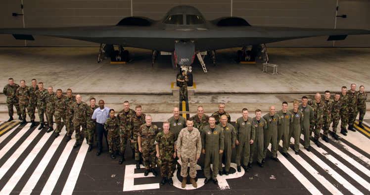 The Chairman of the Joint Chiefs of Staff, Gen. Peter Pace, poses front and center for a picture with members of a B-2 Stealth Bomber squadron, June 2, 2006, at Anderson Air Force Base, Guam. On his way to the annual Shangri-La Dialogue in Singapore, Gen. Pace, stopped in Guam to meet with deployed American forces and to receive a tour of the facilities. Photo by U.S. Air Force Staff Sgt. D. Myles Cullen