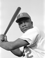 Jackie Robinson of the Brooklyn Dodgers, posed and ready to swing...