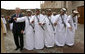President George W. Bush poses with a group of traditional dancers, Monday, Jan. 14, 2008, during a visit to the Sheikh Saeed Maktoum House, home of Vice President and Prime Minister of the United Arab Emirates Sheikh Mohammed bin Rashid al-Maktoum, in Dubai. White House photo by Eric Draper