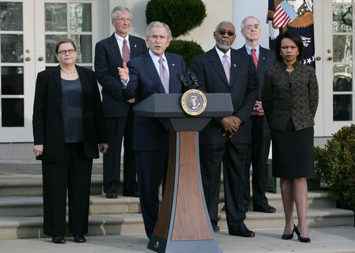 President George W. Bush addreses members of the media in the White House Rose Garden following his video teleconference Tuesday, Jan. 8, 2008, with Iraq Provincial Reconstruction Team Leaders and Brigade Combat Commanders. President Bush is joined from left by Kristin Hagerstrom, John Smith, Dr. John Jones, U.S. Secretary Condoleezza Rice and Deputy Secretary of Defense Gordon England. The PRT's mission is to help strengthen moderate Iraqi leaders at the local, municipal and provincial level by providing assistance to help create jobs, deliver basic services and build up local economies. White House photo by Chris Greenberg