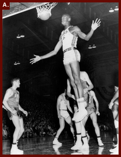 "Hoop's a daisy! Chicago, Ill. Bill Russell ... star of the [University of] San Francisco Dons, ... sinks a basket against Southern Methodist University in the semi-finals of the N.C.A.A. [basketball] tournament Thursday night," [195-]