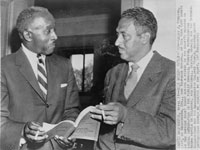 Louis L. Redding of Wilmington, Delaware, and Thurgood Marshall, General Counsel for the NAACP, conferring at the Supreme Court, during recess in the Court's hearing on racial integration in public schools