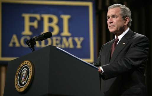 President George W. Bush delivers remarks about key accomplishments and the ongoing efforts in the war on terrorism during a visit Monday, July 11, 2005, to the FBI Academy in Quantico, Va. Said the President, "The FBI efforts are central to our success in the war on terror. And I thank you for that." White House photo by Eric Draper