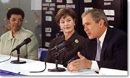 President George W. Bush talks an education roundtable with Laura Bush and Rosa Smith, Superintendent of the Columbus School district at Sullivant Elementary School in Columbus, Ohio on February 20, 2001. (White House Photo by Paul Morse)