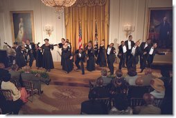 The Show Choir from the Duke Ellington School of the Arts performs for President George W. Bush at the Celebration of African American Music, History, and Culture in the East Room May 28. "The music and culture of Black Americans has brought great beauty into this world. Today it brings great pride to our country," said the President. White House photo by Eric Draper.