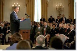 President George W. Bush announces an initiative for a new Cuba Policy in the East Room Monday, May 20. "If Cuba's government takes all the necessary steps to ensure that the 2003 elections are certifiably free and fair -- certifiably free and fair -- and if Cuba also begins to adopt meaningful market-based reforms, then -- and only then -- I will work with the United States Congress to ease the ban on trade and travel between our two countries," said the President. White House photo by Tina Hager.