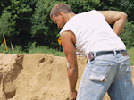 Man shoveling dirt