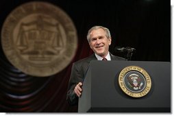 President George W. Bush receives a warm welcome from the delegates and guests at the annual convention of the National Association for the Advancement of Colored People (NAACP), as he prepares to deliver his remarks Thursday, July 20, 2006 in Washington, D.C.  White House photo by Eric Draper