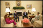 President George W. Bush and Mrs. Laura Bush visit with President Alejandro Toledo of Peru, and his wife and advisor, Mrs. Eliane Karp de Toledo, during a photo opportunity Tuesday, July 11, 2006, in the Oval Office. White House photo by Eric Draper