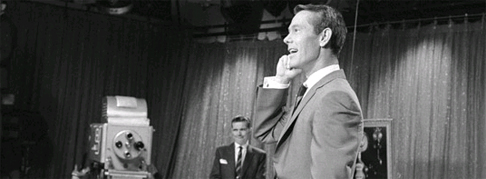 Carson delivers his monologue, 1965. His humor set the standard for television hosts and comedians for generations to come.
