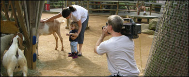 Photo: Cameraman filming a public health video