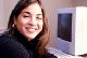 Photo of a woman at a computer