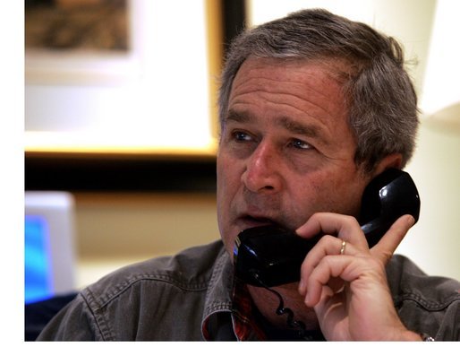 President George W. Bush calls troops Thanksgiving Day from his ranch in Crawford, Texas, Thursday, Nov. 25, 2004. White House photo by Tina Hager.