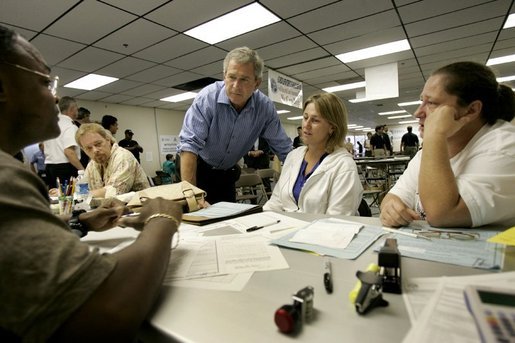 President George W. Bush visits with hurricane relief workers at Martin County Red Cross Headquarters in Stuart, Fla., Thursday, Sept. 30, 2004. "See, these volunteers show the true heart of America, because we're a compassionate people, we care when a neighbor hurts, we long to help somebody when help is needed," said the President. "They have the gratitude of all they've served, and they have the admiration for our whole country." White House photo by Eric Draper